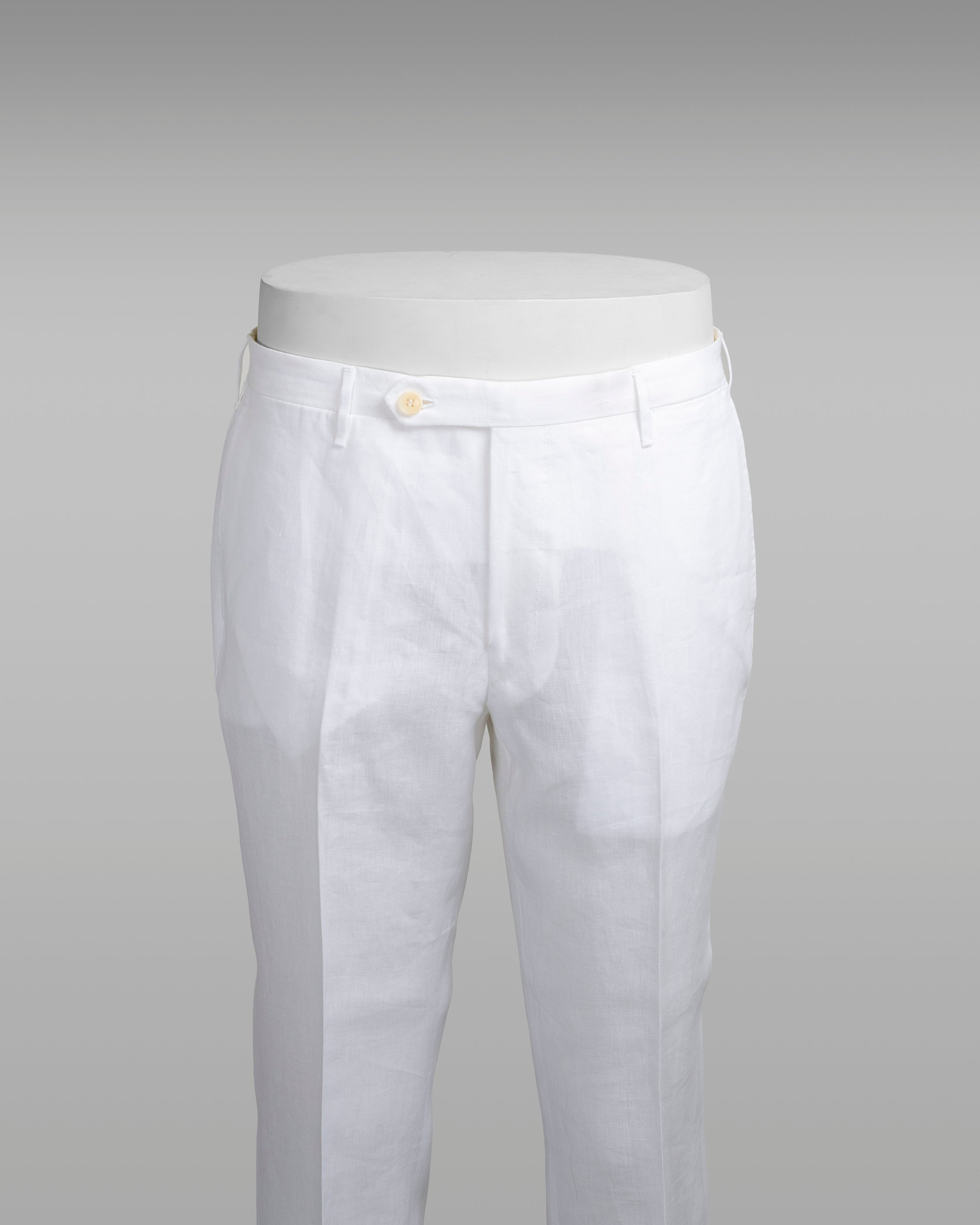 White pair of regular fit linen trousers