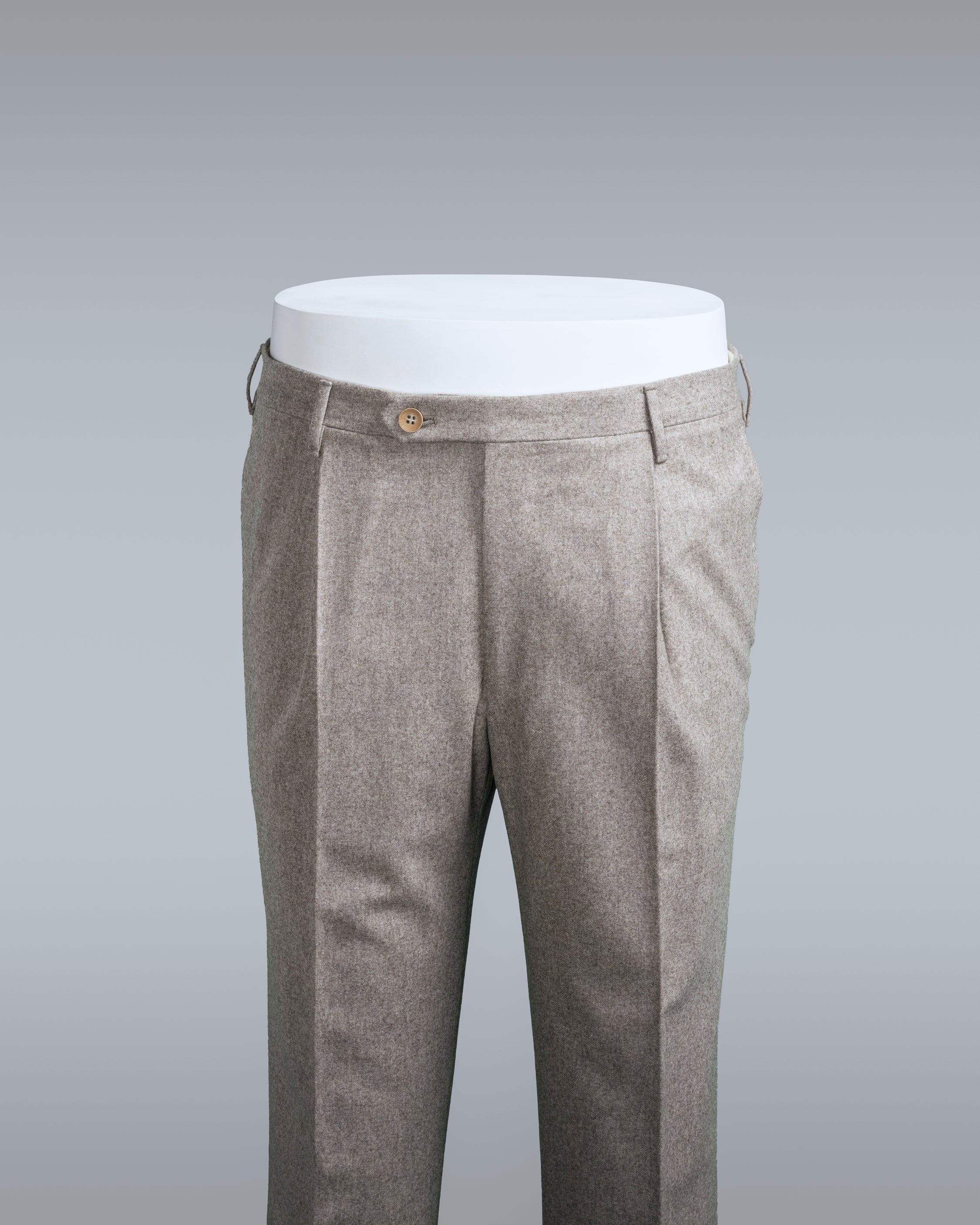 Light beige pair of regular fit wool flannel trousers