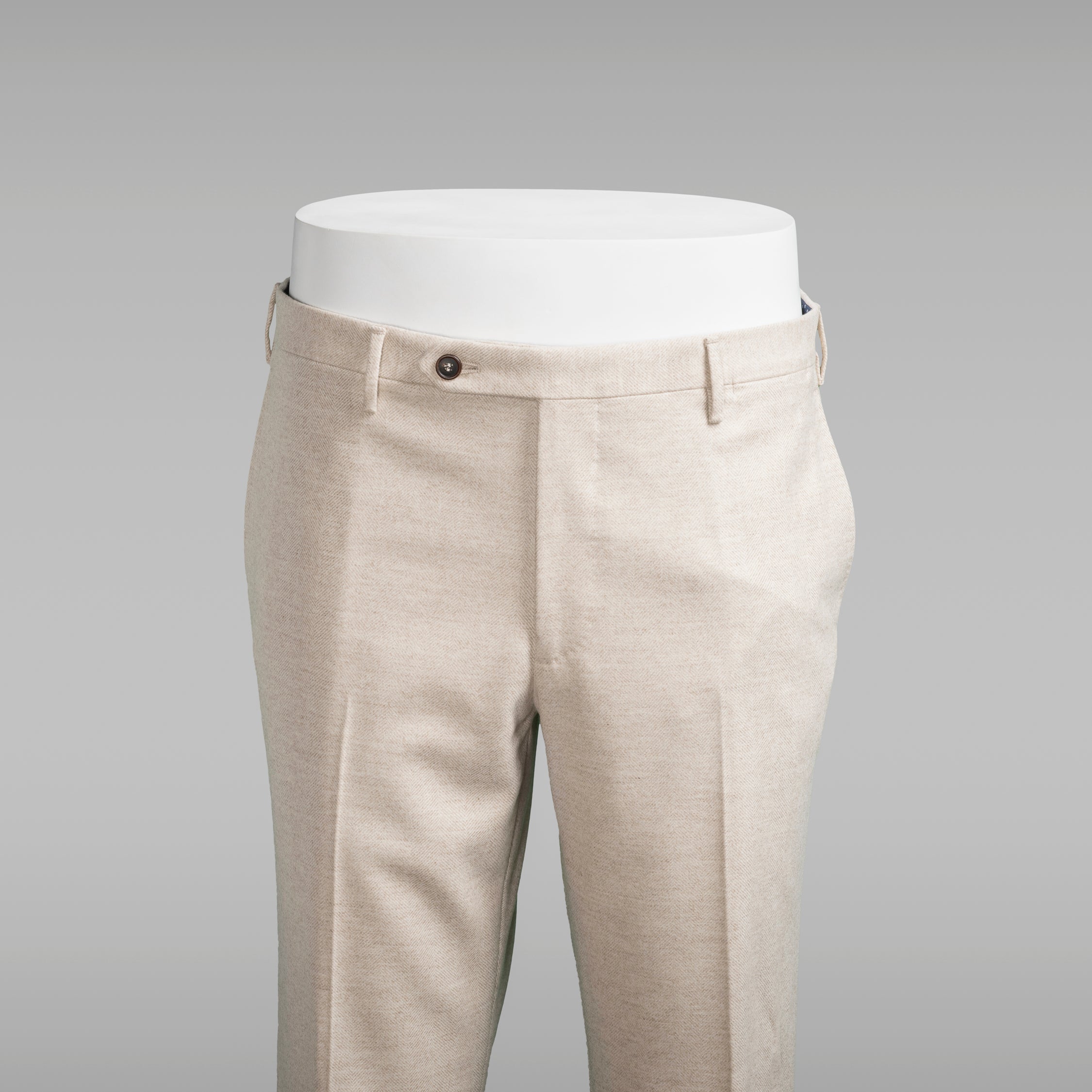 Pantaloni in flanella beige chiaro a spina di pesce