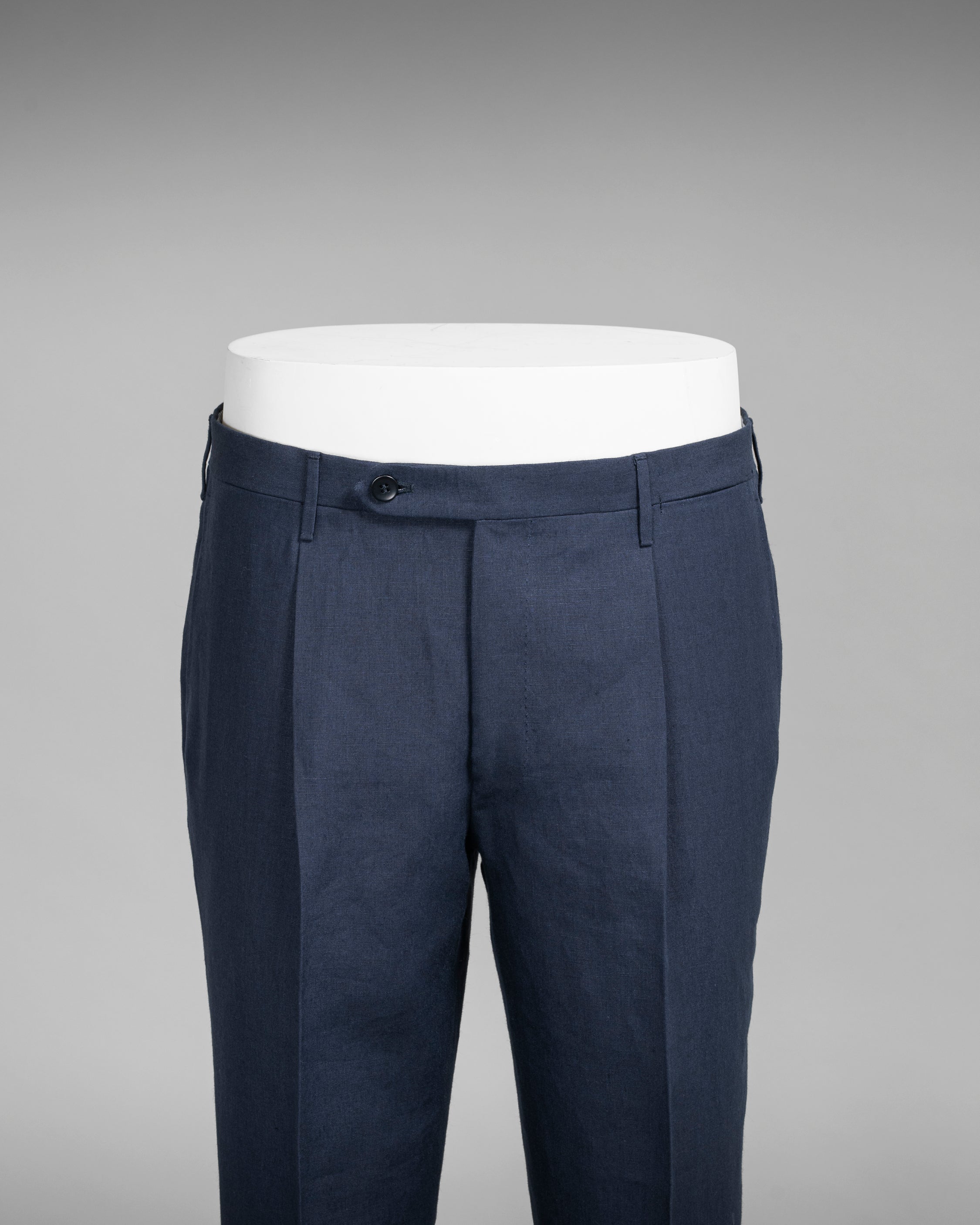 Dark blue pair of regular fit linen trousers