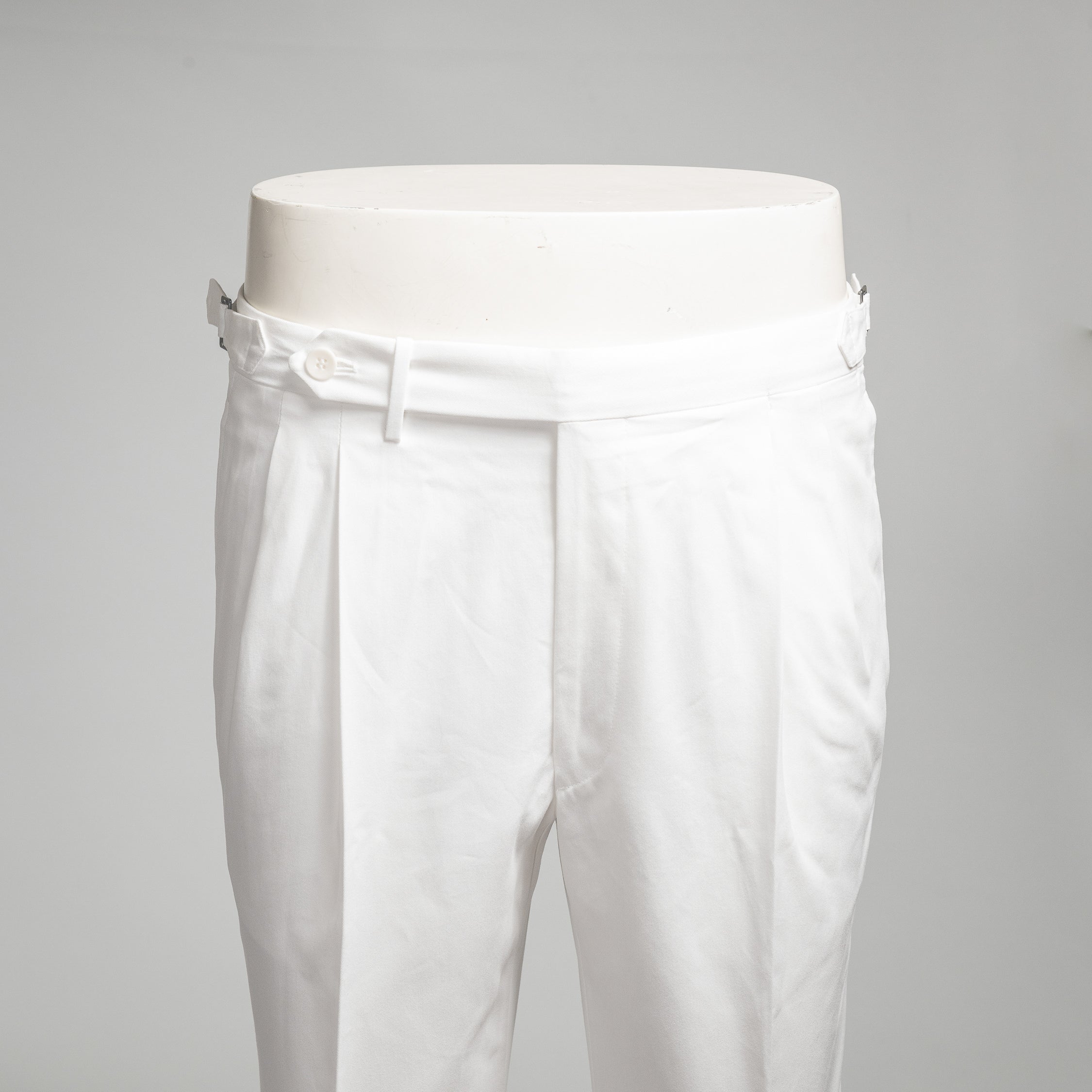 White pair of regular fit cotton trousers