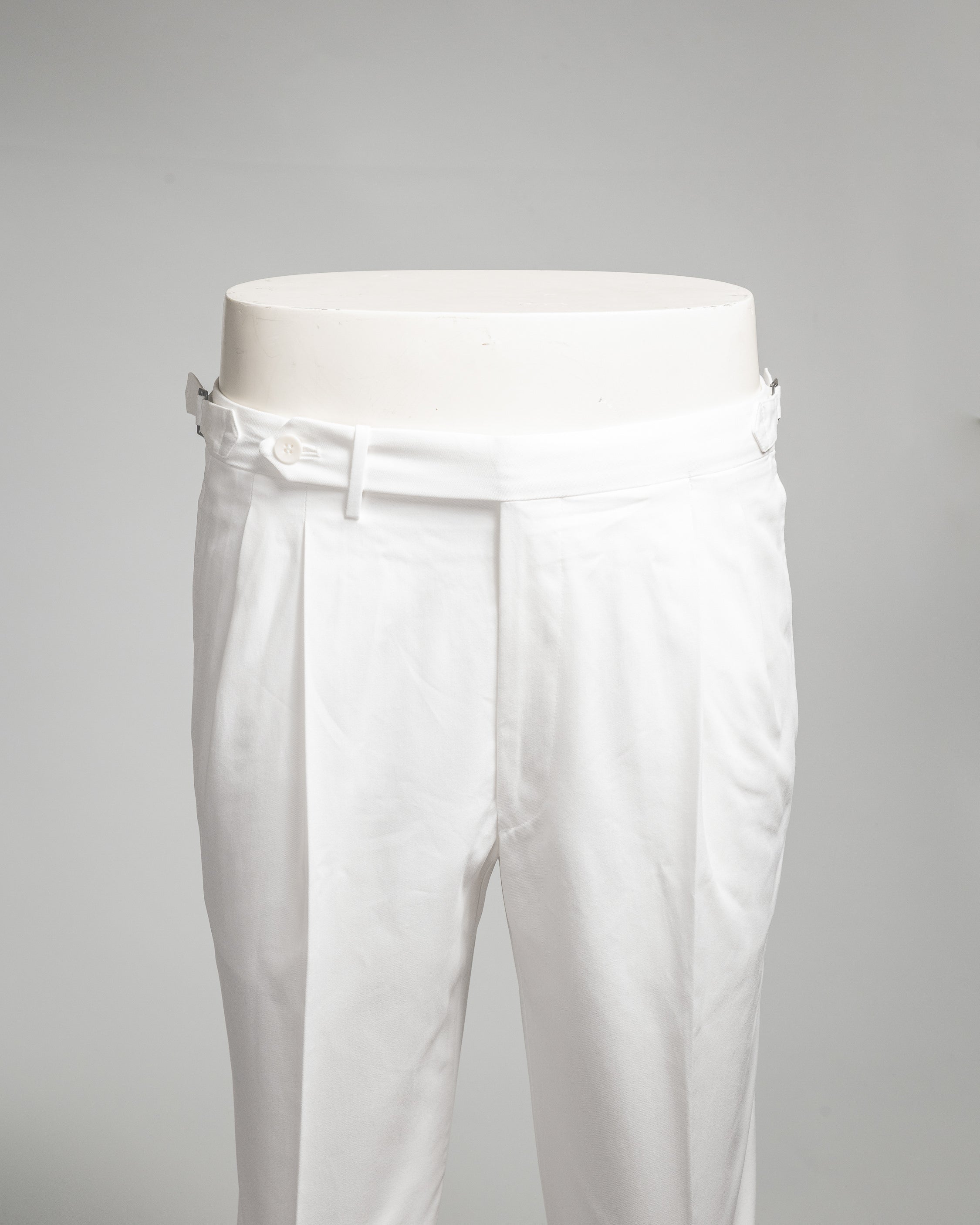 White pair of regular fit cotton trousers