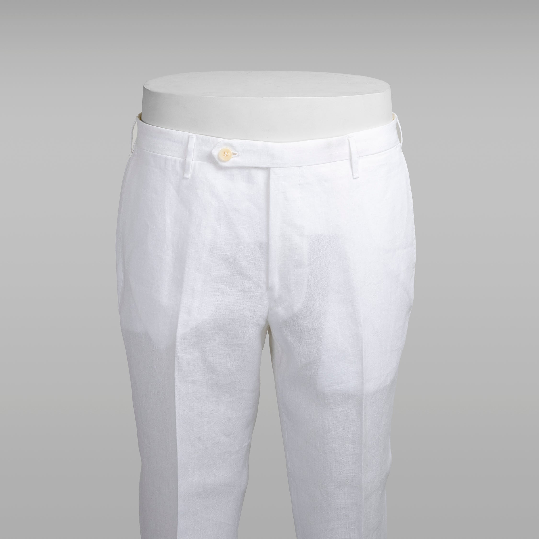 White pair of regular fit linen trousers