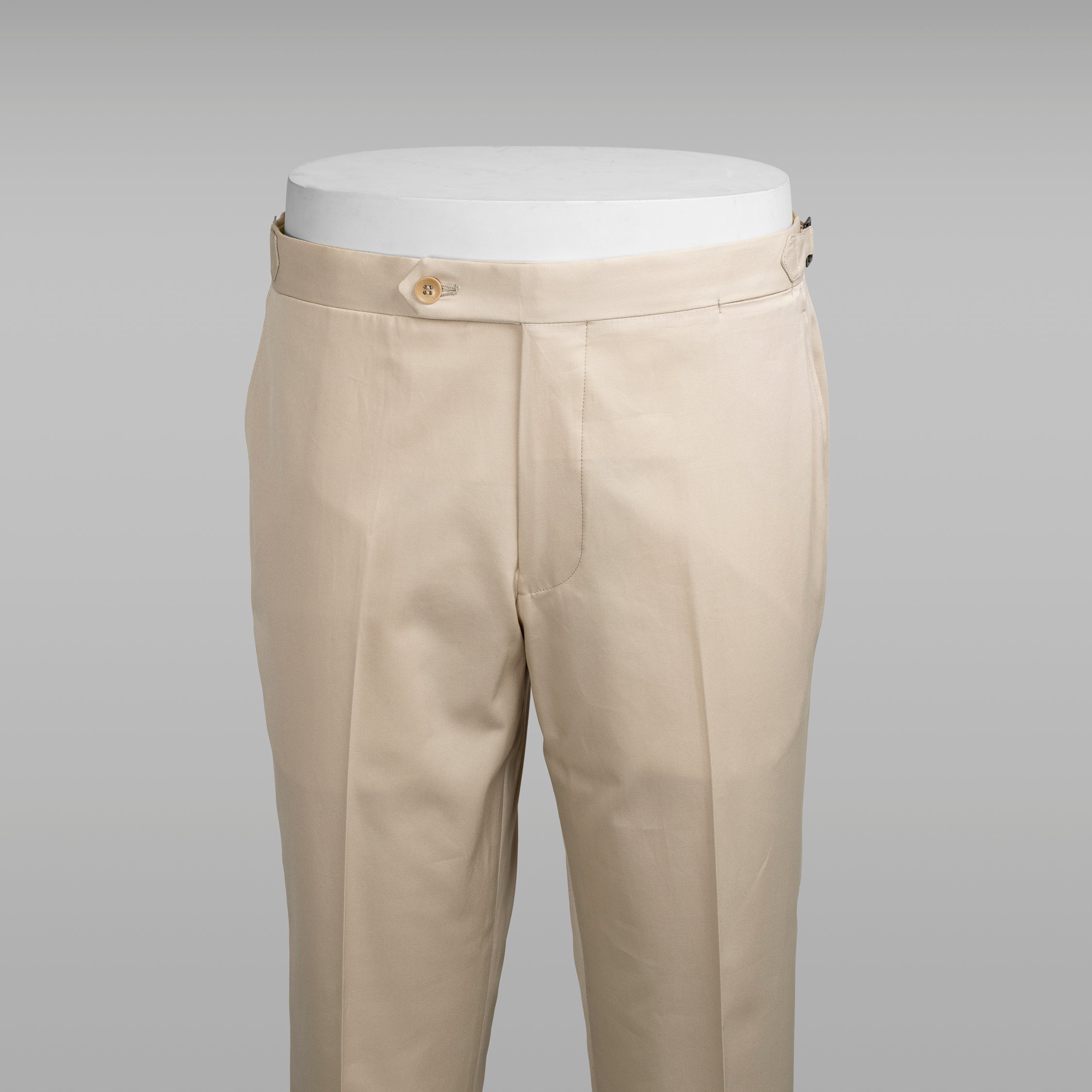 Light beige pair of regular fit supima cotton trousers